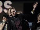Win Butler of Arcade Fire accepts the Grammy. (AP/Matt Sayles)